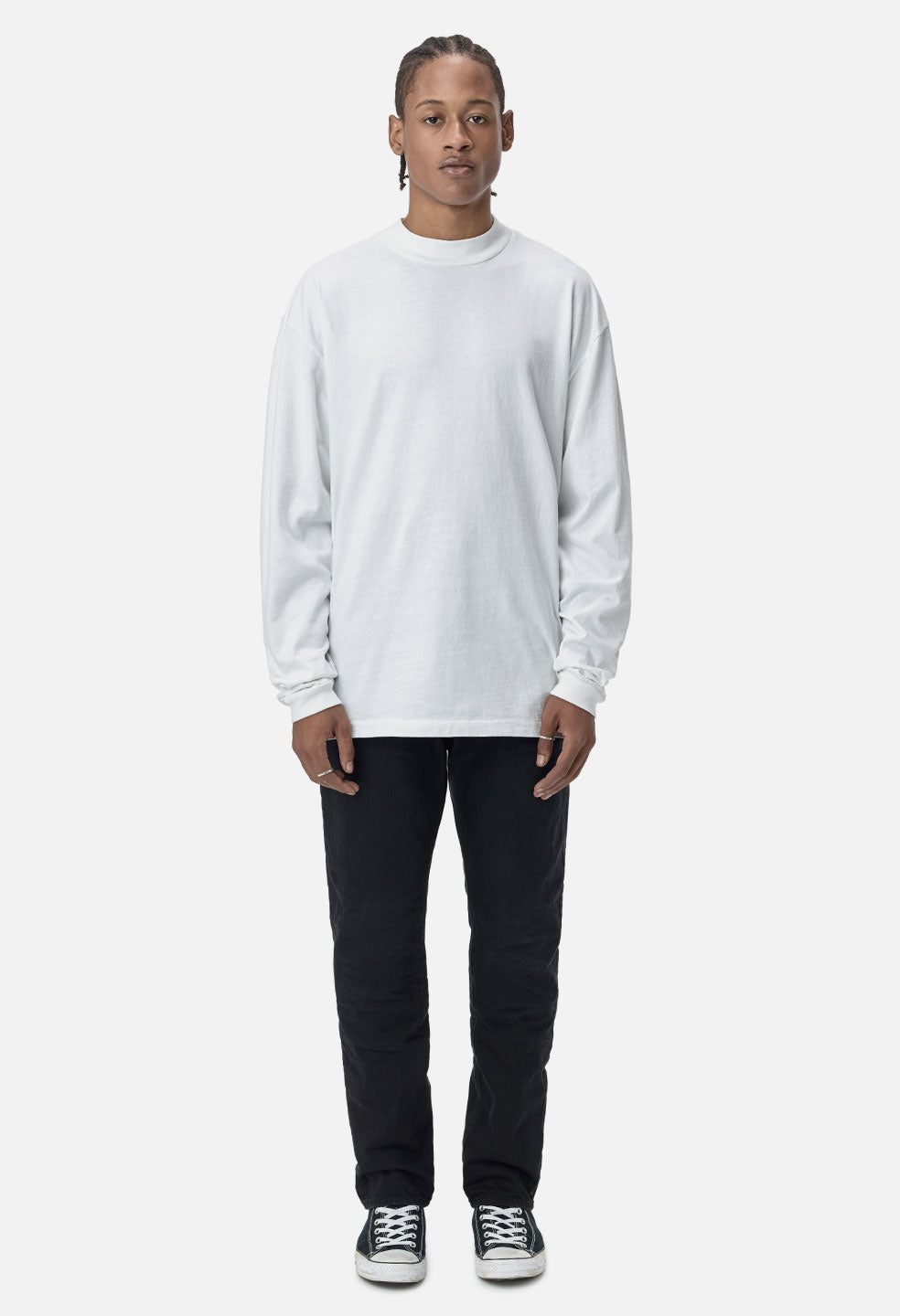 Mock up of white long sleeve t-shirt and short pants wearing by